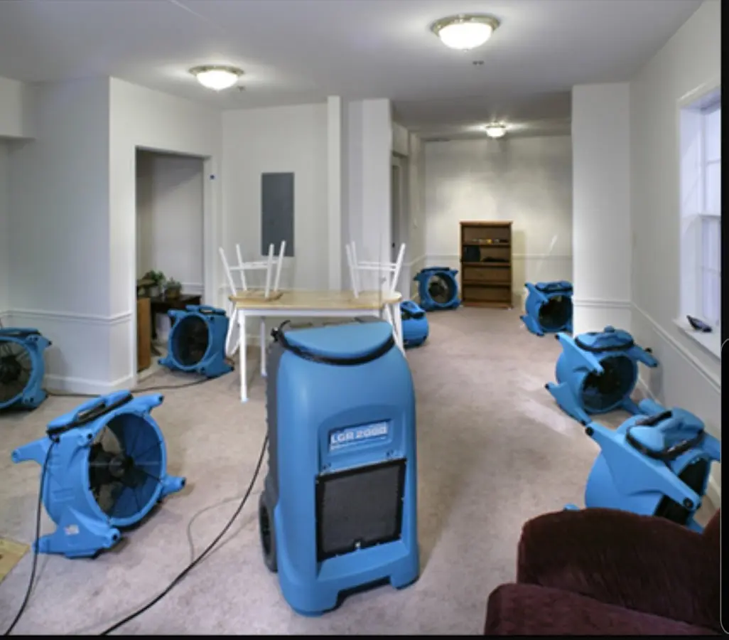 Air movers and dehumidifier setup for Water Damage Restoration in Mentor